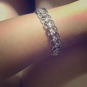 Silver bracelet with pink rhinestones